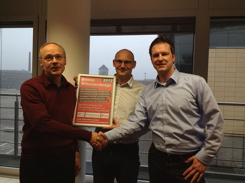Ernst Rieso, Messe Bremen, übergibt das Projekt „Mittelstandsmesse“ an die neuen Veranstalter Michael Brassat und Gordon Sommer.
