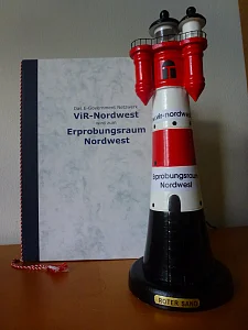 Gründungspapier und Symbolobjekt für die neu gegründete Virtuelle Region Nordwest