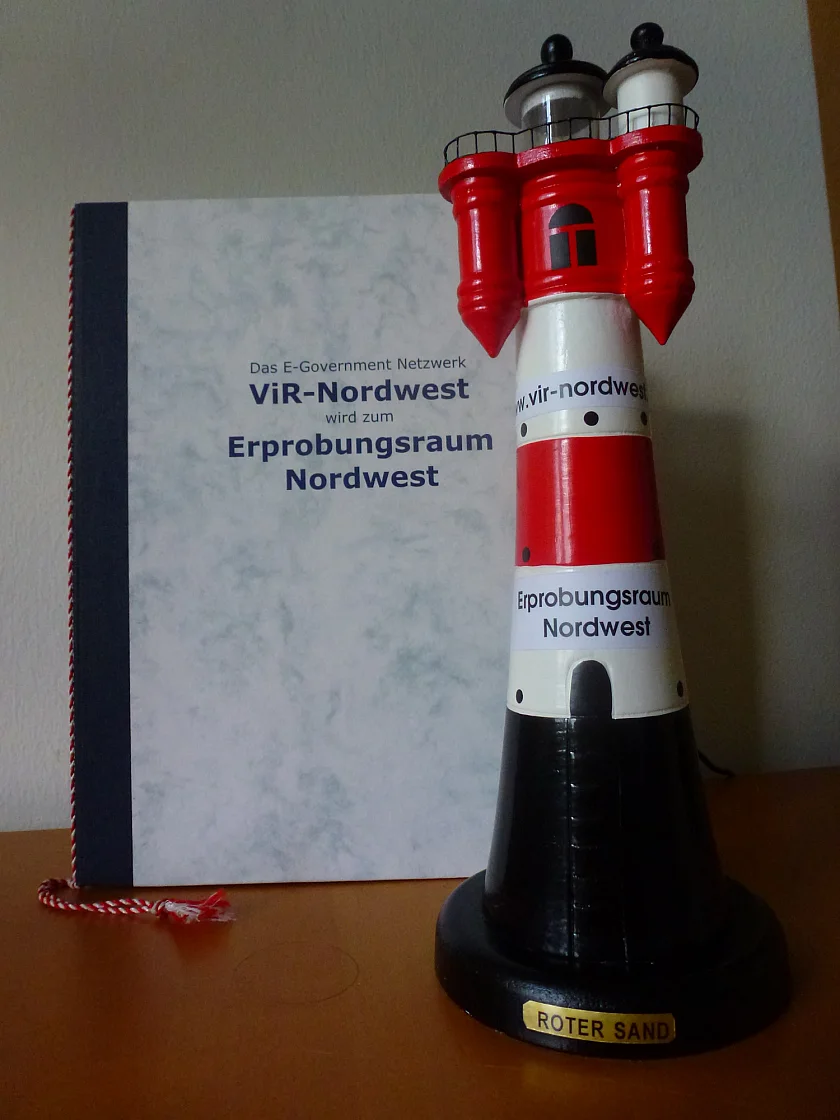 Gründungspapier und Symbolobjekt für die neu gegründete Virtuelle Region Nordwest